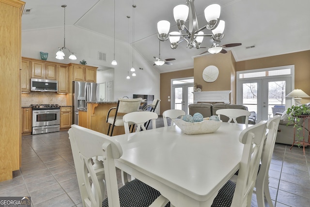 dining room featuring visible vents, crown molding, and french doors