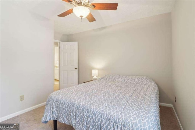 bedroom featuring carpet floors, ceiling fan, and baseboards