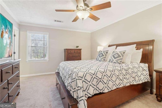 bedroom featuring crown molding, light colored carpet, visible vents, a ceiling fan, and baseboards