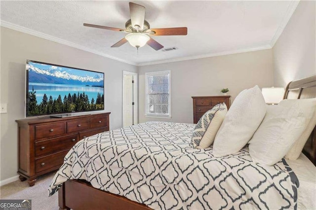 bedroom with light carpet, baseboards, visible vents, ceiling fan, and crown molding