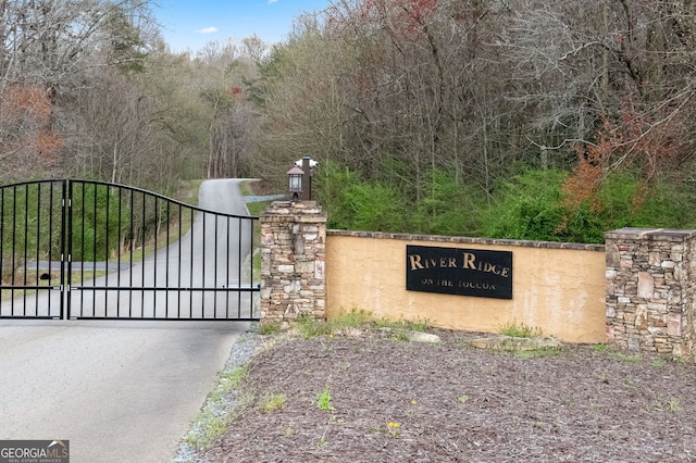 community sign with a gate