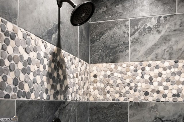 details featuring a tile shower