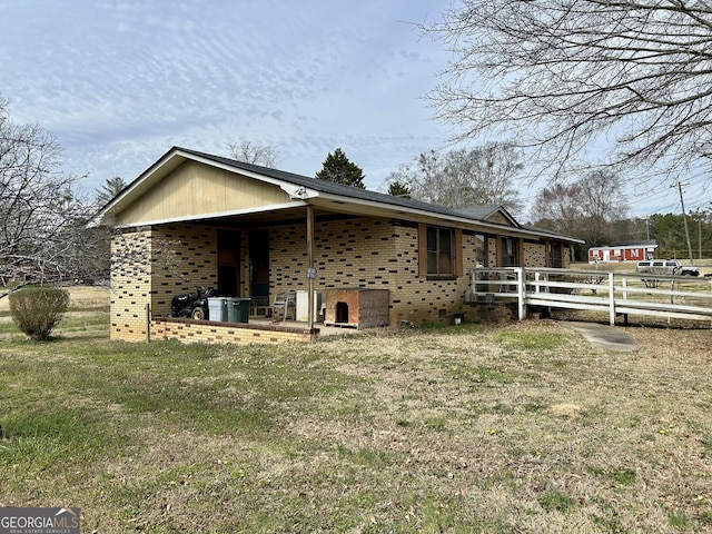 exterior space featuring brick siding