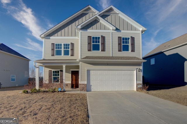 craftsman house featuring board and batten siding, concrete driveway, and brick siding