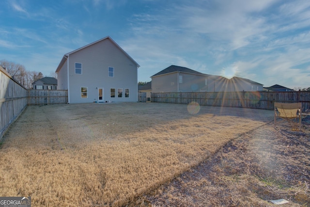 view of yard featuring a fenced backyard