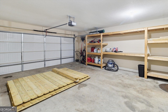 garage featuring a garage door opener