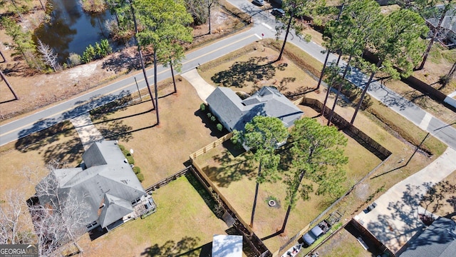 drone / aerial view featuring a water view