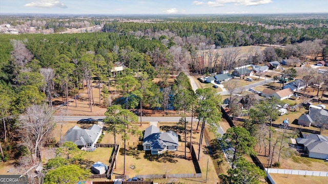 aerial view featuring a forest view