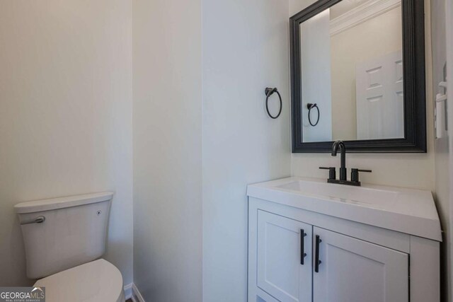 3800 George Williams Rd, Monroe, GA 30656 - half bath featuring vanity and toilet