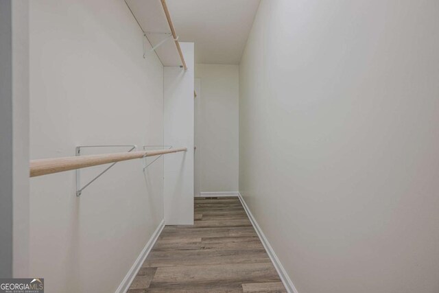 3800 George Williams Rd, Monroe, GA 30656 - walk in closet featuring wood finished floors