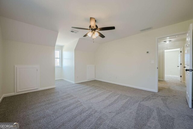 3800 George Williams Rd, Monroe, GA 30656 - bonus room featuring lofted ceiling, carpet, visible vents, and baseboards