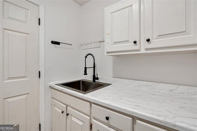 laundry room featuring a sink