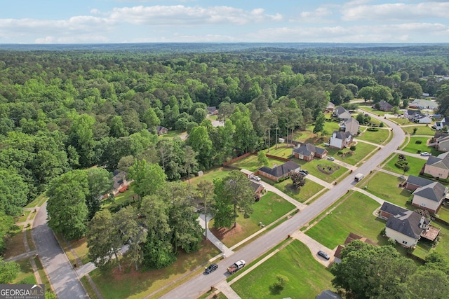 2768 Southpark Blvd SW, Conyers, GA 30094 - aerial view of property and surrounding area with a heavily wooded area and nearby suburban area