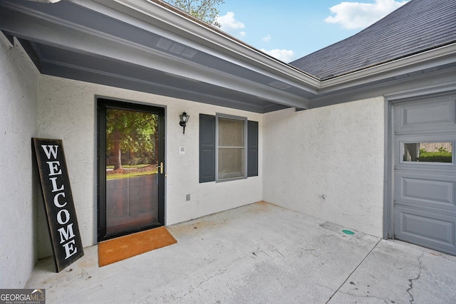 2768 Southpark Blvd SW, Conyers, GA 30094 - doorway to property with stucco siding and a patio