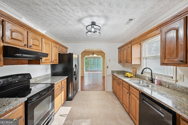 2768 Southpark Blvd SW, Conyers, GA 30094 - kitchen featuring black appliances, under cabinet range hood, a sink, arched walkways, and light stone counters
