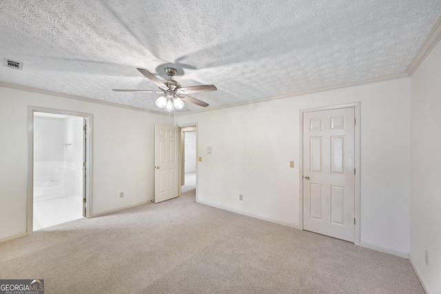 2768 Southpark Blvd SW, Conyers, GA 30094 - unfurnished bedroom featuring carpet flooring, a textured ceiling, baseboards, ensuite bathroom, and ceiling fan