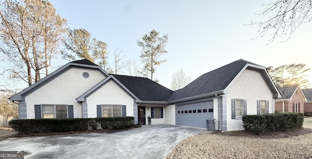 2768 Southpark Blvd SW, Conyers, GA 30094 - ranch-style home featuring a garage, stucco siding, and driveway