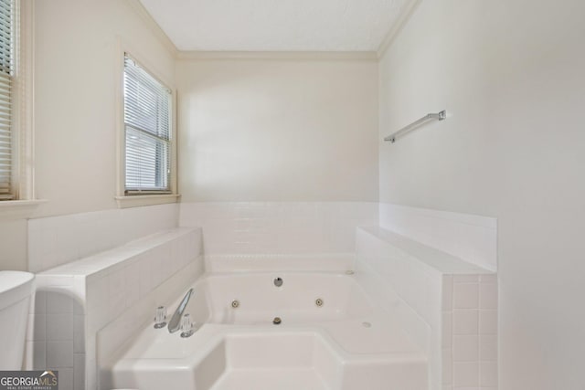 2768 Southpark Blvd SW, Conyers, GA 30094 - bathroom featuring a jetted tub and crown molding