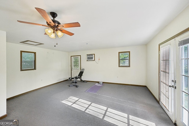 2768 Southpark Blvd SW, Conyers, GA 30094 - workout room featuring plenty of natural light, baseboards, an AC wall unit, and ceiling fan