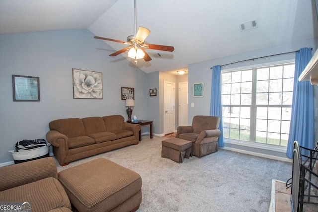 carpeted living area featuring lofted ceiling, baseboards, visible vents, and a ceiling fan