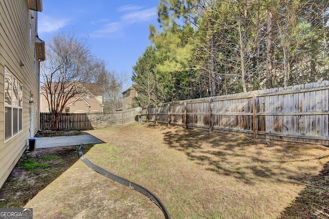 view of yard featuring a fenced backyard