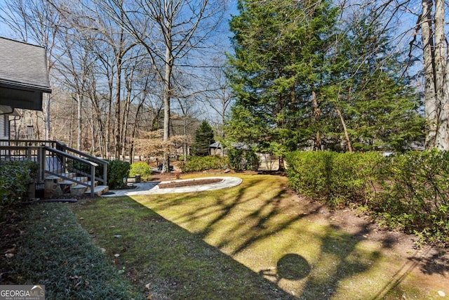 view of yard with stairway