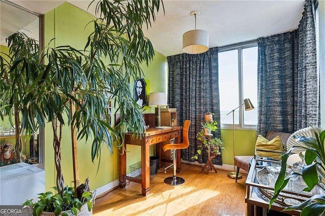 sitting room with wood finished floors