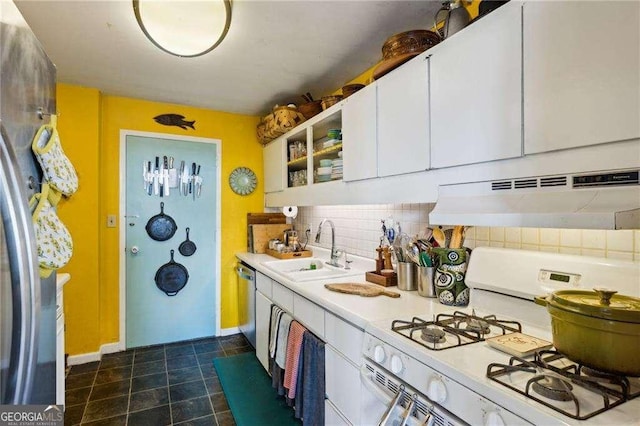 kitchen featuring stainless steel dishwasher, white cabinets, a sink, white range with gas stovetop, and under cabinet range hood