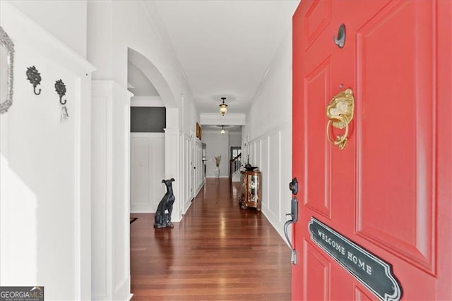 entryway with stairway and wood finished floors