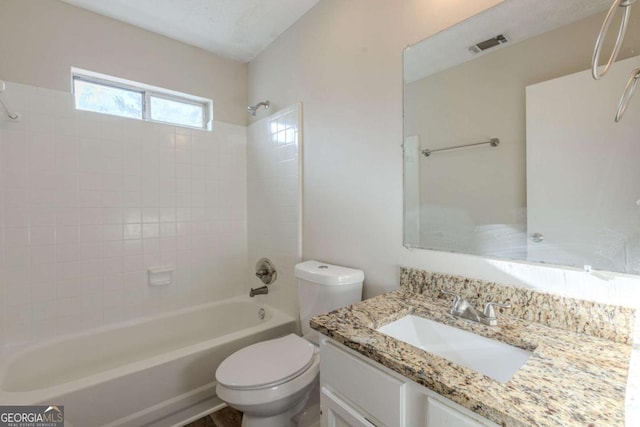 bathroom with shower / bath combination, visible vents, toilet, and vanity