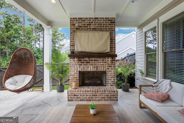 view of patio / terrace featuring an outdoor living space with a fireplace