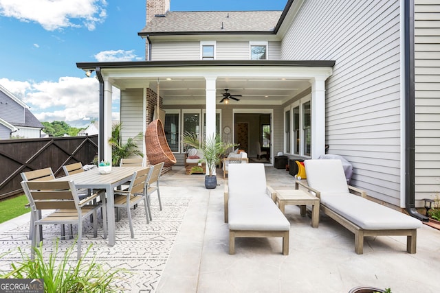 view of patio / terrace with ceiling fan, outdoor dining area, outdoor lounge area, and fence