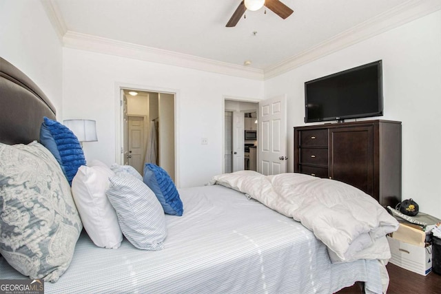 bedroom with a ceiling fan, crown molding, and wood finished floors