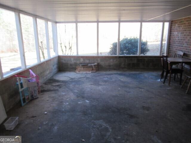 sunroom featuring plenty of natural light