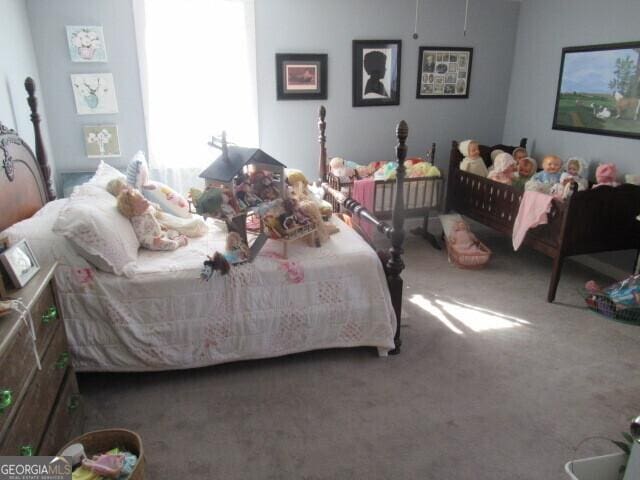 bedroom featuring carpet flooring