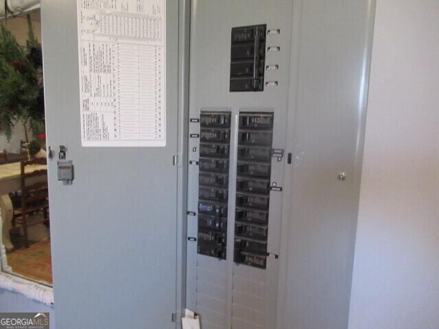 utility room featuring electric panel