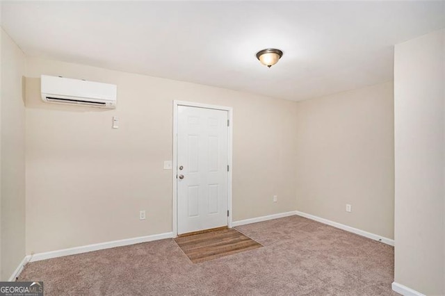 carpeted empty room with baseboards and a wall mounted AC