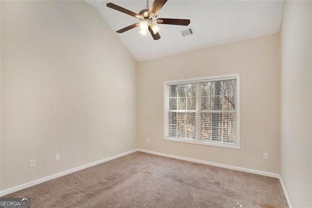 unfurnished room with carpet floors, lofted ceiling, visible vents, ceiling fan, and baseboards