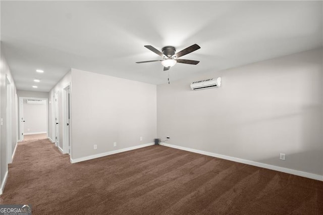 carpeted empty room featuring baseboards, a ceiling fan, and a wall mounted AC