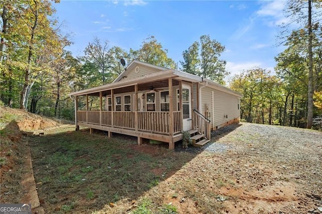 rear view of house featuring crawl space