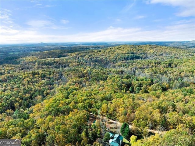 aerial view featuring a forest view