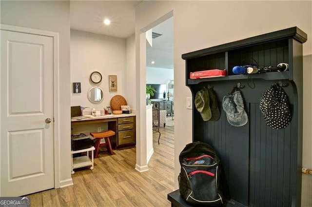 mudroom featuring light wood-style floors and visible vents