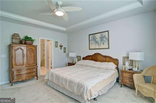 bedroom with light carpet, a raised ceiling, a ceiling fan, and baseboards