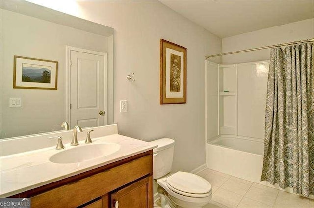 bathroom with tile patterned flooring, vanity, toilet, and shower / bath combo with shower curtain