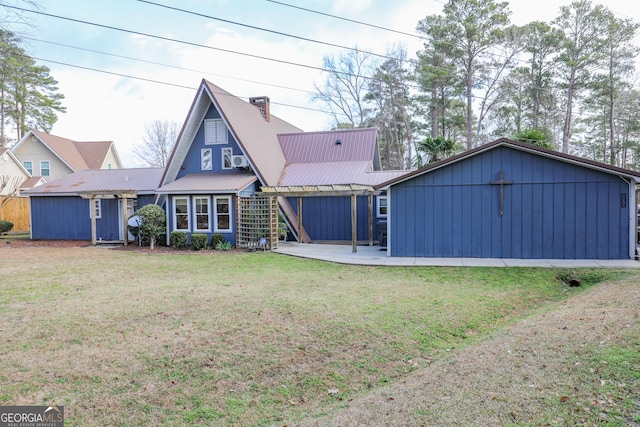 106 Honeysuckle Ln NE, Milledgeville, GA 31061 - back of property featuring a yard and a patio