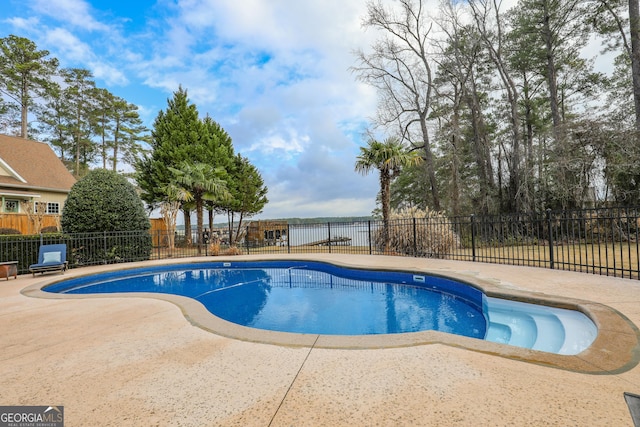 106 Honeysuckle Ln NE, Milledgeville, GA 31061 - view of pool featuring a patio and a water view