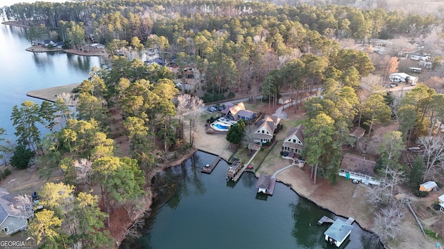 106 Honeysuckle Ln NE, Milledgeville, GA 31061 - view of property location with a nearby body of water and a heavily wooded area