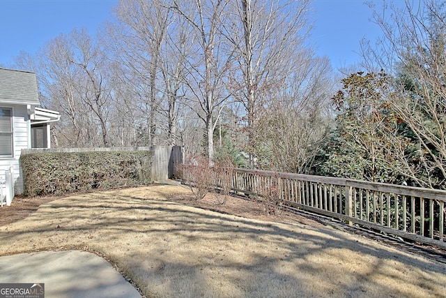 view of yard with fence