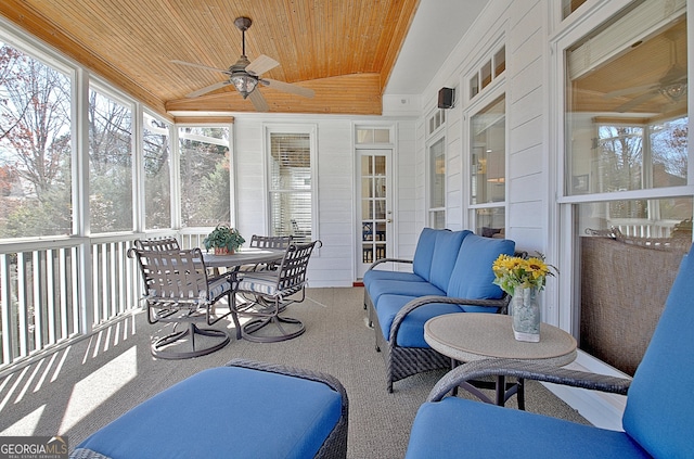 sunroom with wooden ceiling, vaulted ceiling, and a ceiling fan