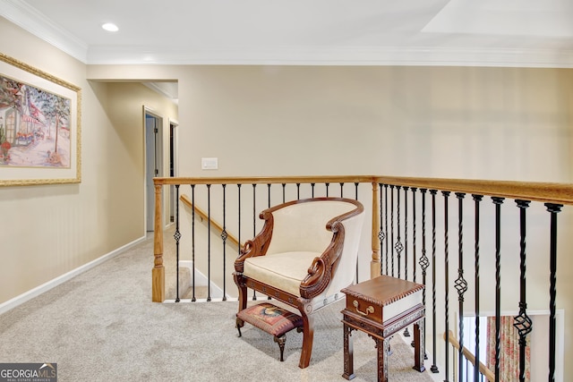 sitting room featuring recessed lighting, an upstairs landing, baseboards, carpet, and crown molding